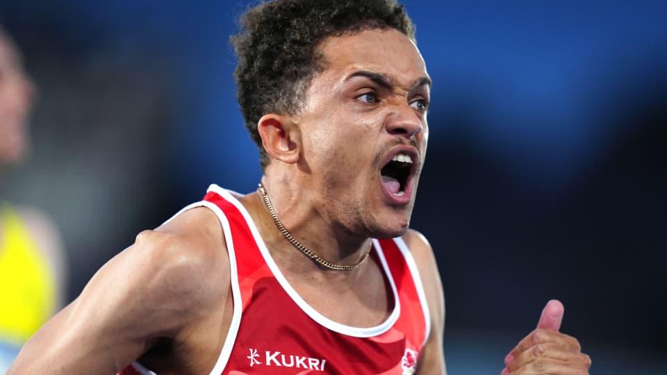 Tom young celebrates winning gold