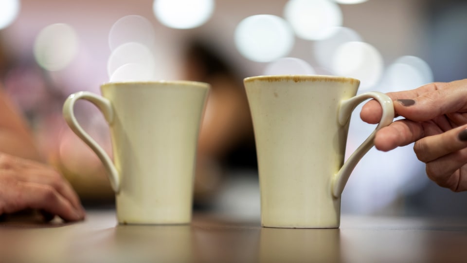 Photo of two mugs of tea on a table