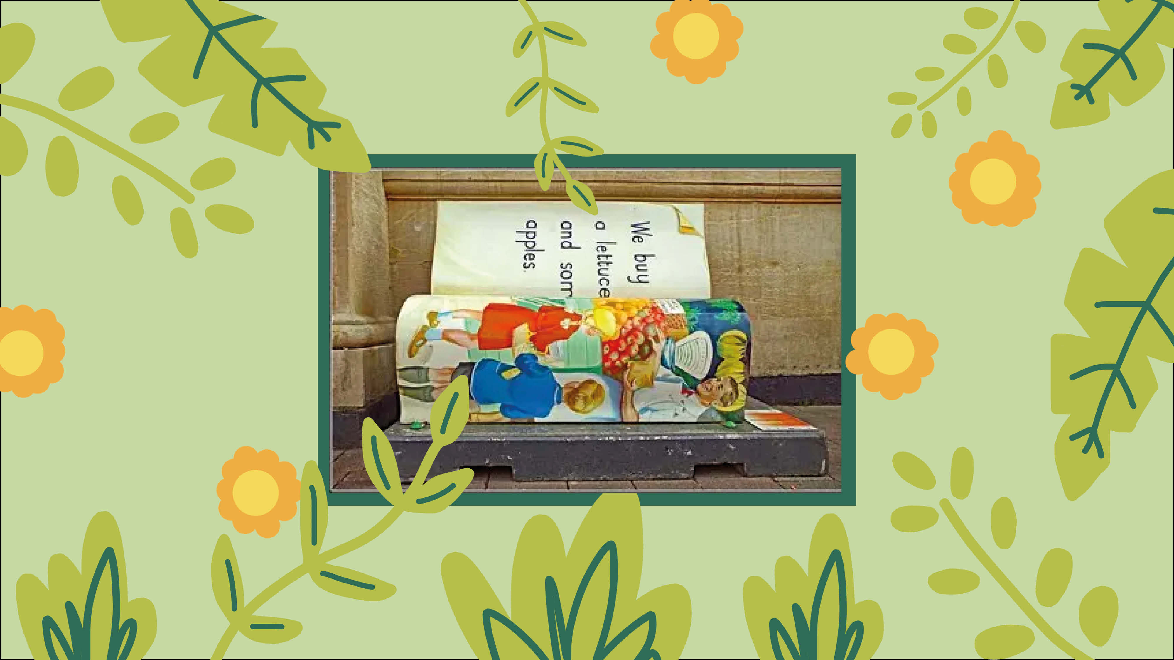 Pale green background with illustrated flowers dotted over it and a photograph of a bench that has been designed to look like the pages of an open book. The painted design is illustrations from a children's book.