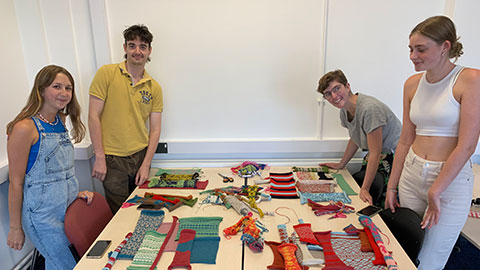 The students displaying their samples