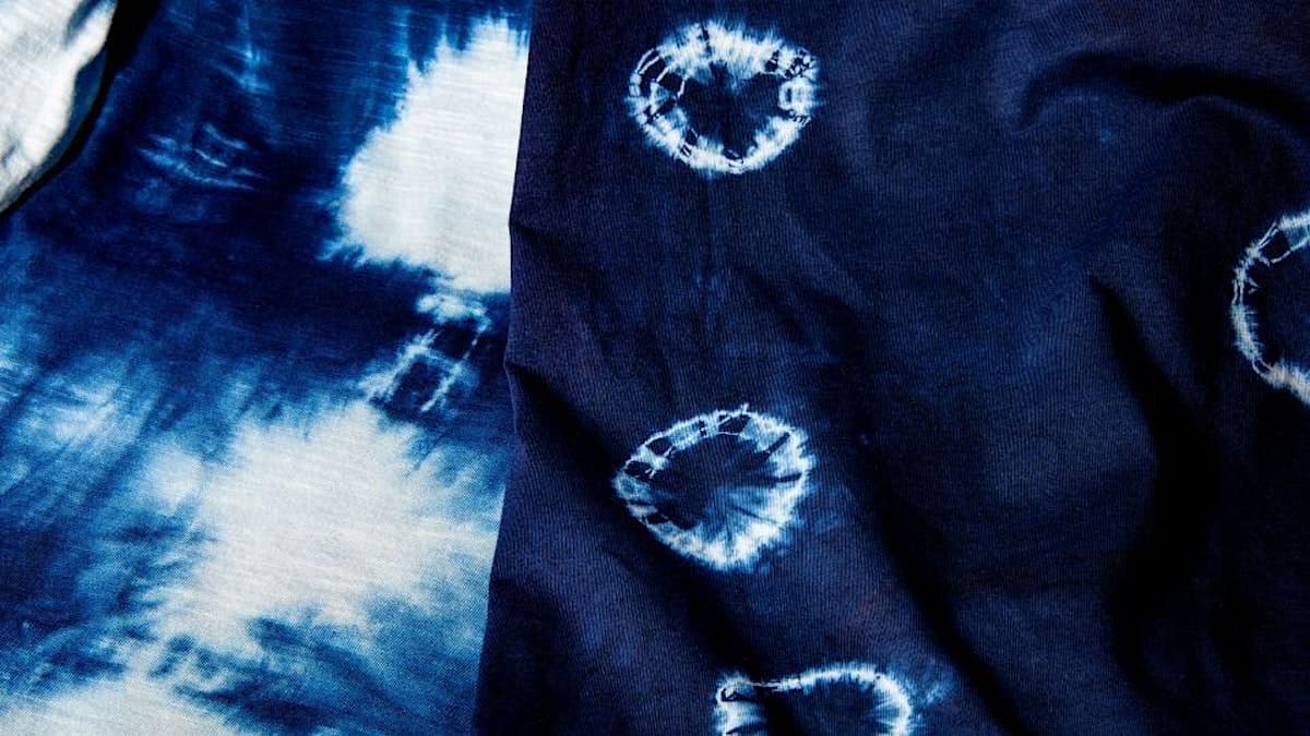 Close up of abstract blue dyed fabric.