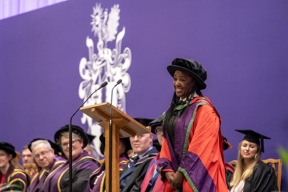 Broadcaster Diane-Louise Jordan is on stage recieving her honorary degree.