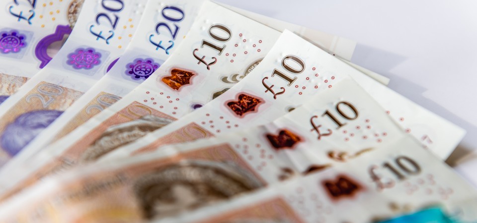 English pound notes fanned out
