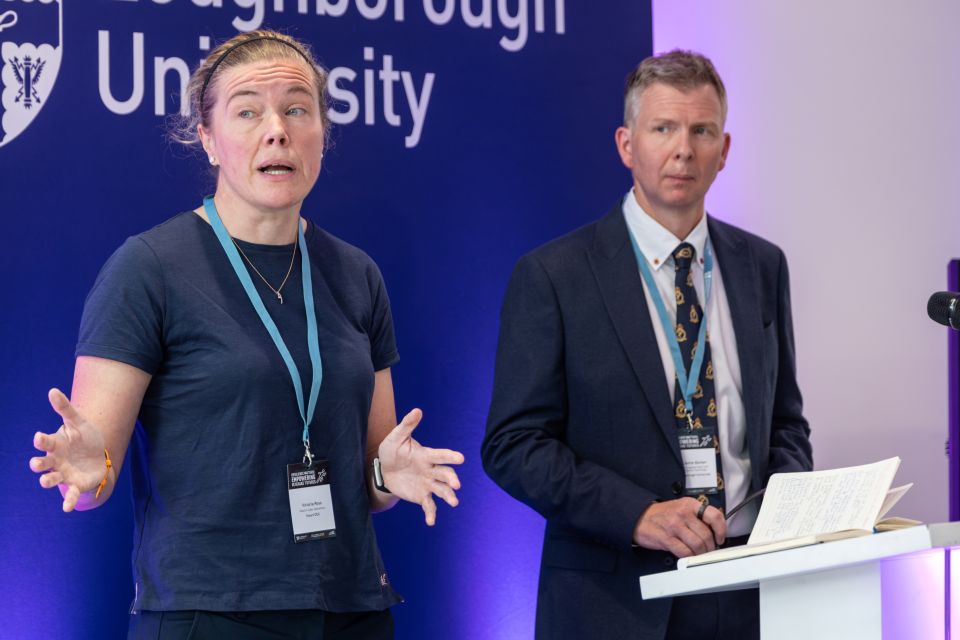 Veteran Vicki Ross speaking at an event with Dr Jamie Barker