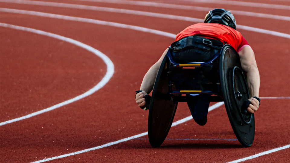 A wheelchair athlete on an athletics track