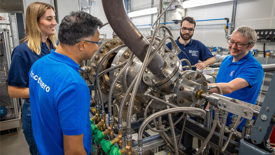 Four engineers in a lab working on a hydrogen project for Rolls-Royce.