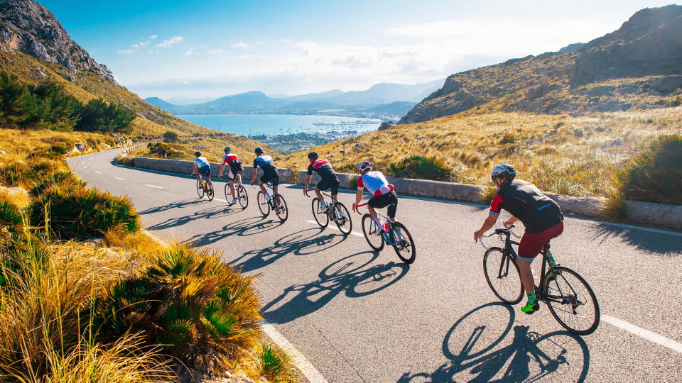 A group of cyclists on the road in Spain.