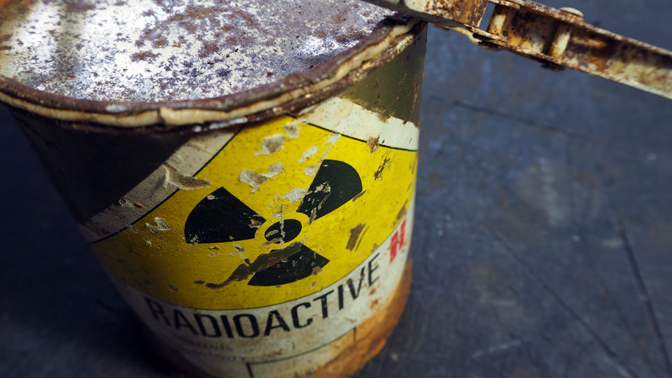 Close up of a barrel of radioactive waste