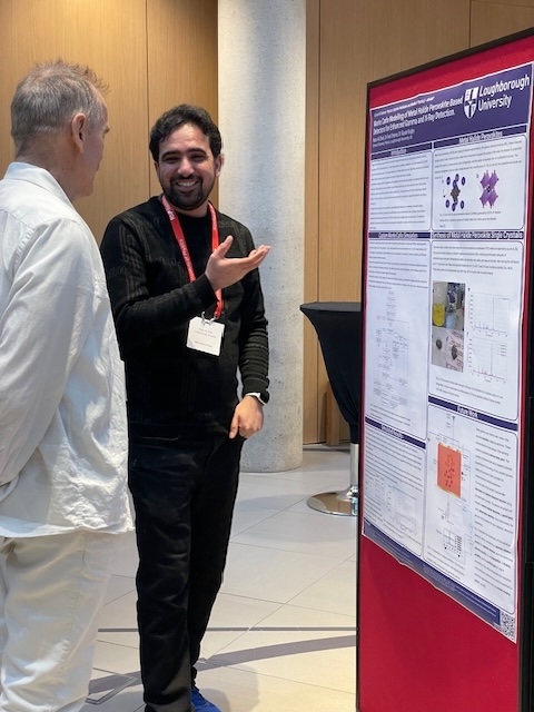 Raza presenting his poster