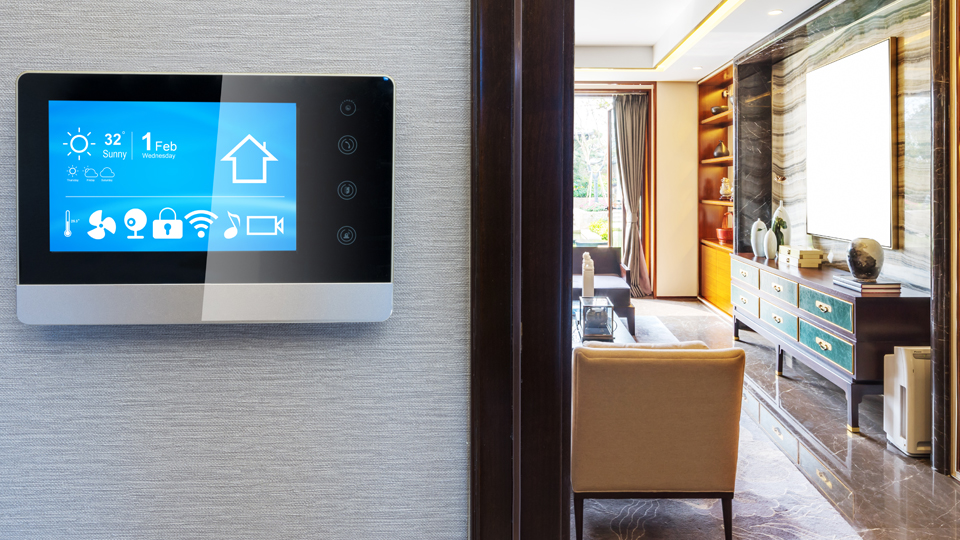 House interior - wall-mounted SMART controls in the left-hand foreground