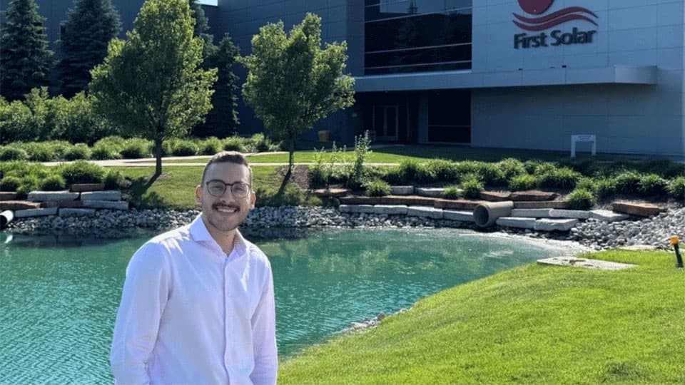 Zeyad Elsayed in front of First Solar building