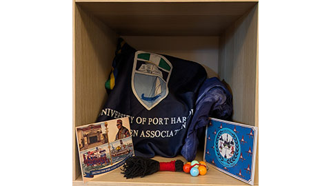 A flag, postcard and bag from Port Hardcourt in Nigeria