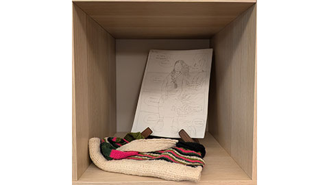 A fabric bag and hand drawn comic page