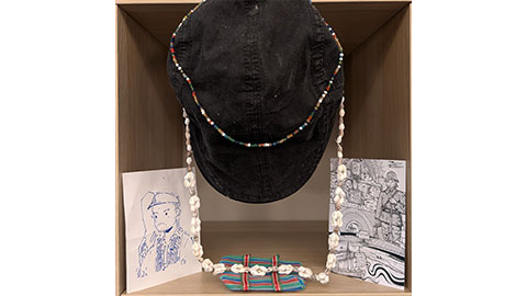 A cap, postcards and necklaces