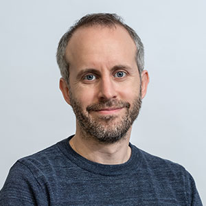 Headshot of IAS Advisory Board member Dr Simon Baker
