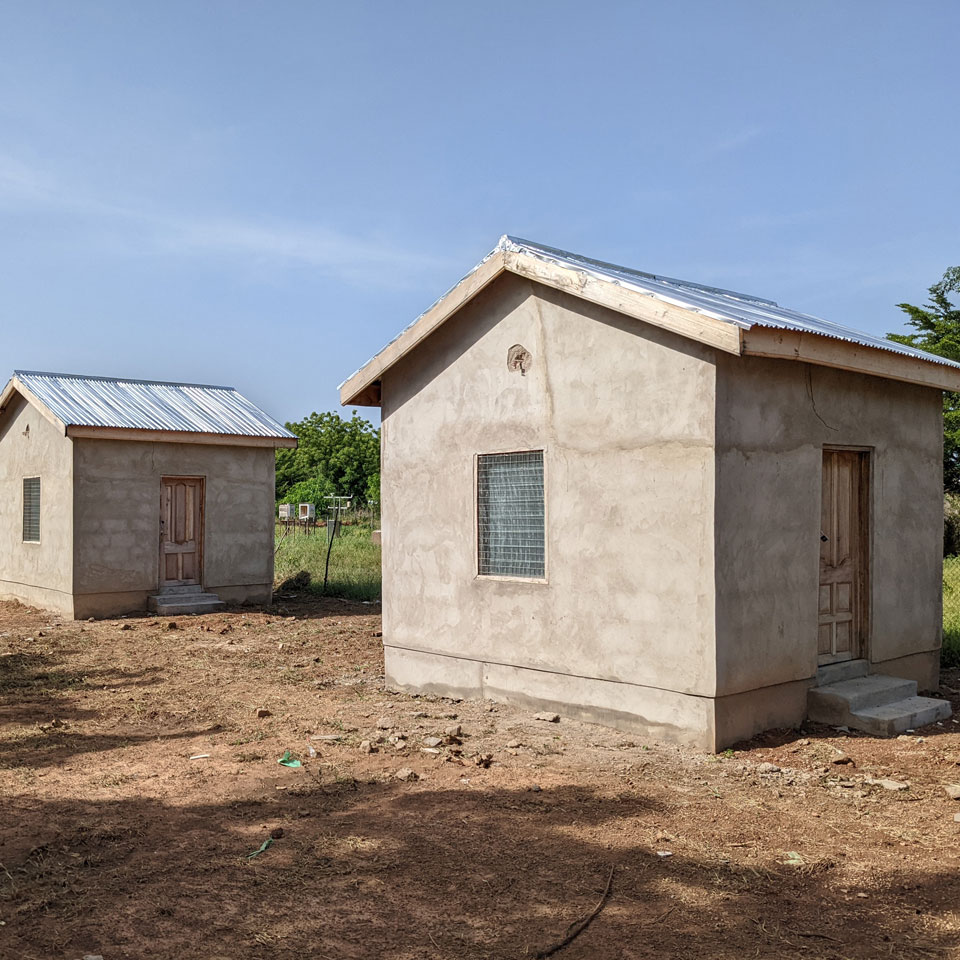 Experimental buildings constructed to test interventions to reduce extreme heat (Ghana)