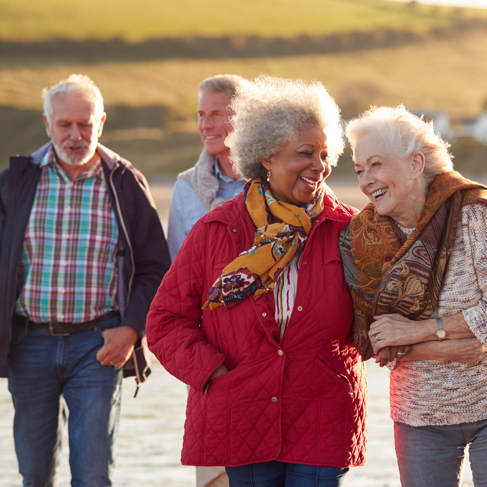 A group of four older people, out for a walk