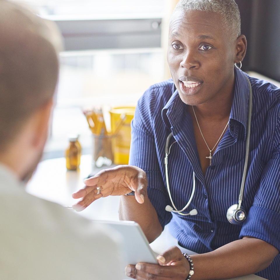 A doctor in conversation with her patient