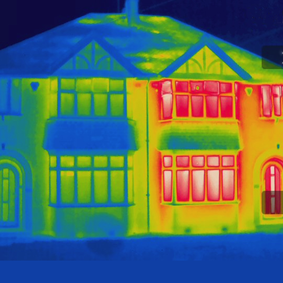 Matched-pair test houses – showing heat loss (right-hand property)