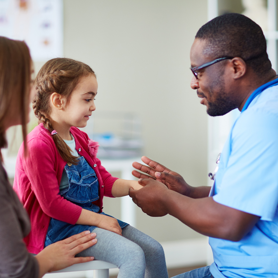 Child and parent visiting a doctor