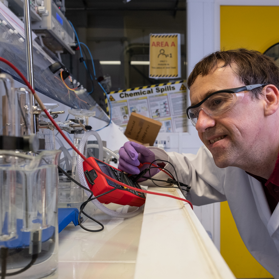 CREST senior researcher, John Barton, looking for hydrogen bubbles from battolyser electrolysis