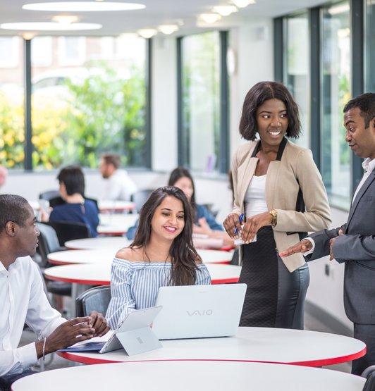 A group of students working together on a training task