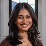 Headshot of RIO staff member Tanisha