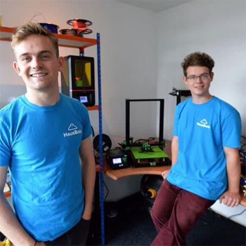 Harry Smith and friend with their robot.