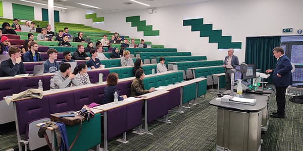 Colm Kelleher delivering a lecture to students.