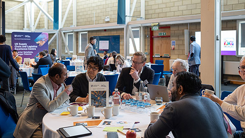Senior industry and academic leaders in discussion at a UK SCALE Centre roundtable event at Loughborough University.