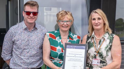 Andrew Rothwell's wife Francis and son Tom receive the inaugural Andrew Rothwell Award.