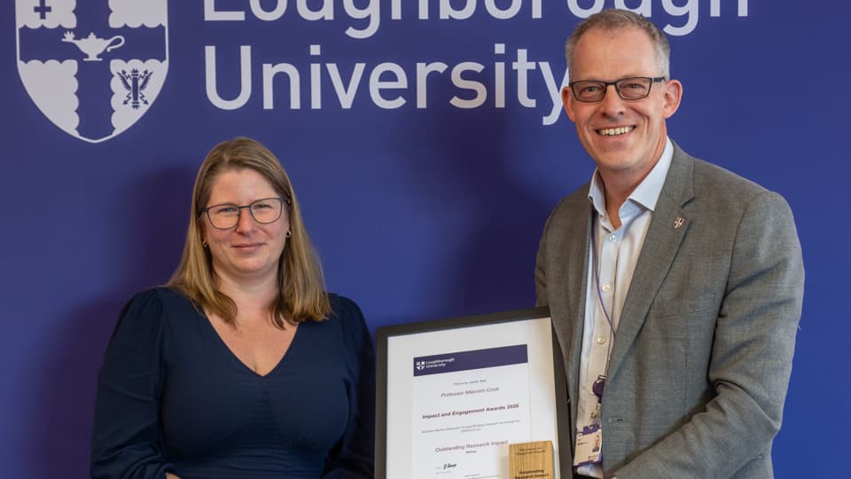 Malcom Cook receives the award for Outstanding Research Impact.