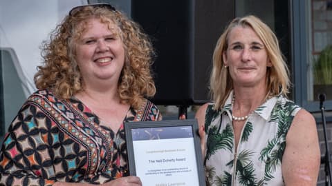 Malika Lawrence receives the Neil Doherty Award.