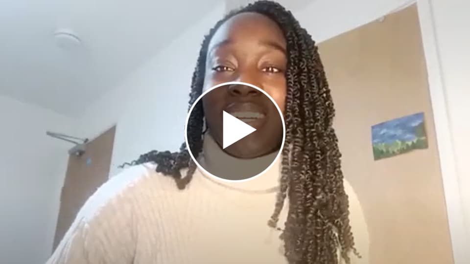Still of Uche's vlog (image of her talking)