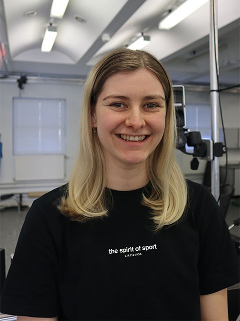 Headshot of Rachael, smiling, looking at the camera.