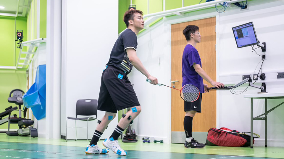Student reviewing biomechanics of a badminton player