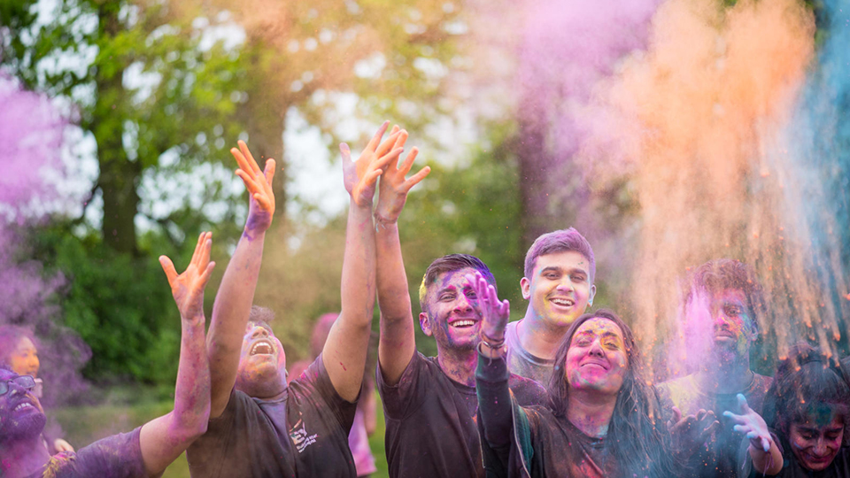 students celebrating Holi