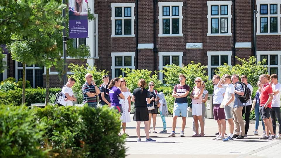 Visitors being showed around campus