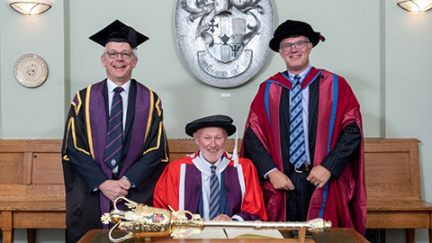 Commodore David Pond, centre, with Provost and Deputy Vice-Chancellor Professor Chris Linton (left), and Professor Mark Lewis, Dean of School of Sport, Exercise and Health Sciences (right).