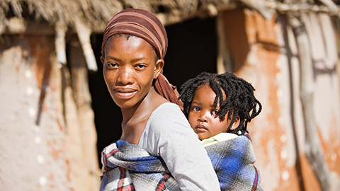 Mother and child looking at camera