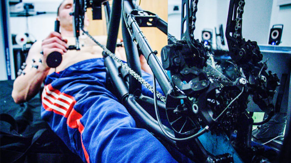 a close up of an athlete using a hand-bike