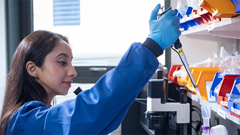 Doctoral Researcher working in a lab