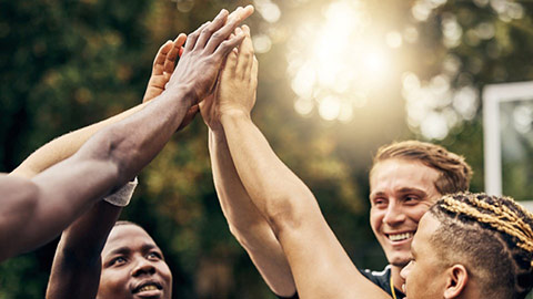 group of people celebrating. Image by Getty 