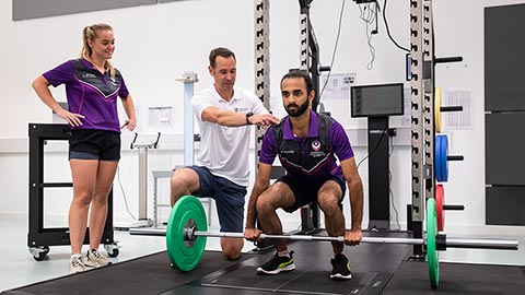 Dr Richard Blagrove teaching two students in our Strength and Conditioning facilities