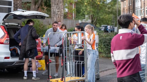Faraday hall committee assisting with arrivals