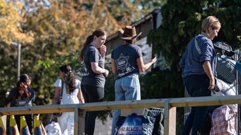 Rutherford helpers directing people to their rooms