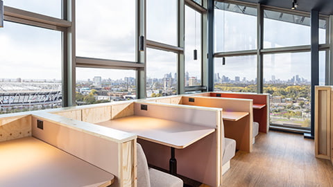 Spacious modern common room with cozy seating areas for study or socialising with incredible views of the city of London.
