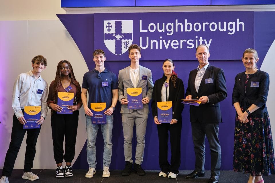 5 students receiving awards from 2 staff