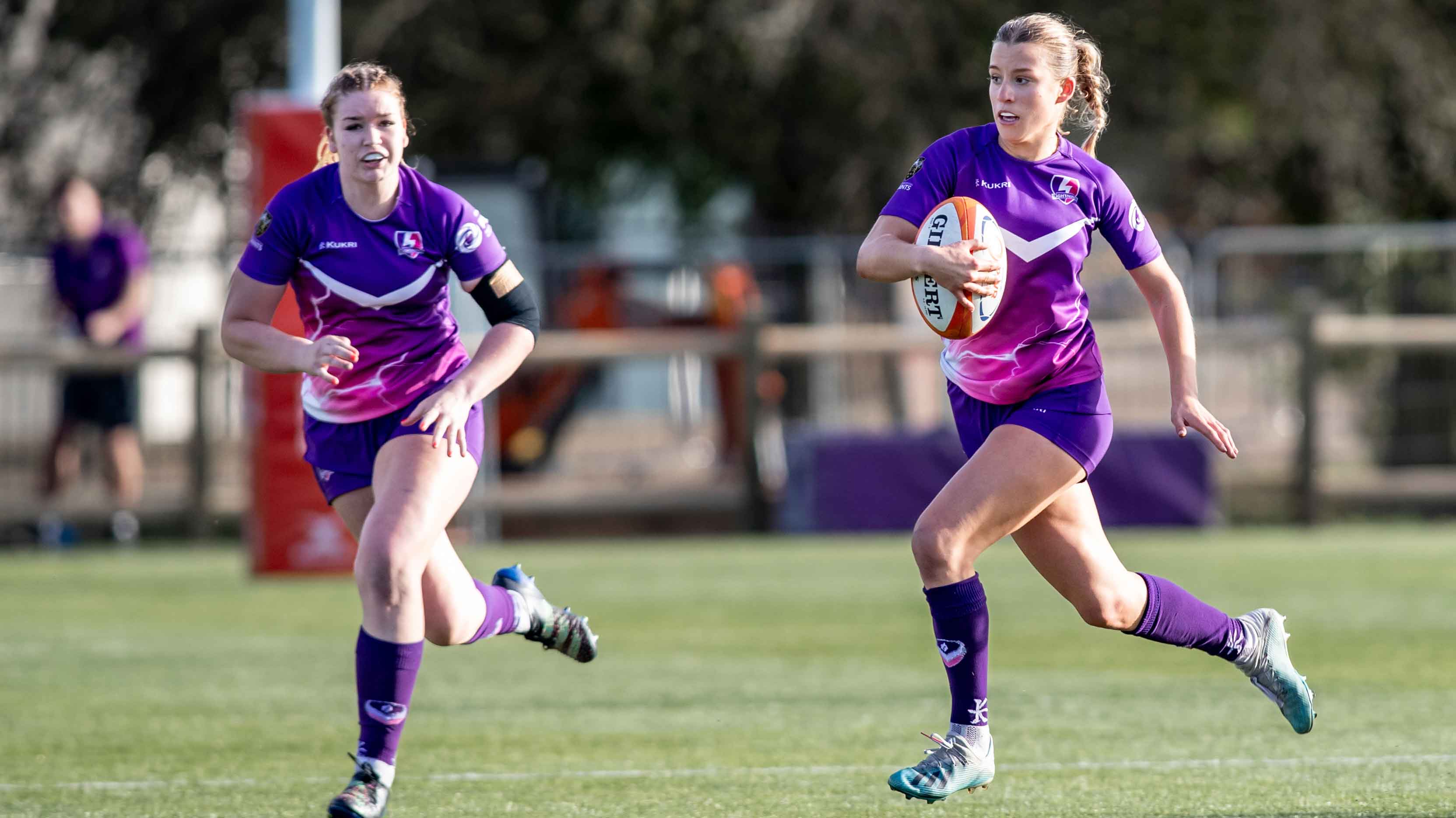 Two Lightning Rugby players in action on a game day.