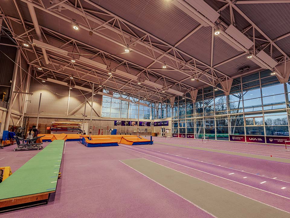 Kitted with jump mats and a track, the indoor centre looks out onto the outdoor track.